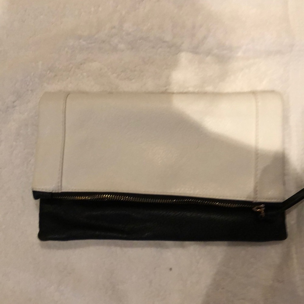 Clutch faux black:white leather